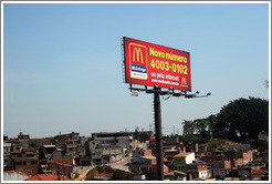 Billboard advertising McDonald's in front of a favela near S&atilde;o Paulo.