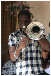 Trombonist Eduardo Sandoval, performing at a private home in Miramar.