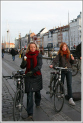 Girls with ice cream cones and bicycles.  Nyhavn (New Harbor).