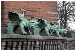 Dragon-like figures in front of R?us (Town Hall).