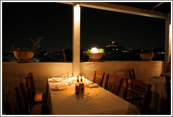 &#917;&#955;&#945;&#953;&#945; restaurant.  Rooftop dining area at night.
