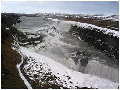 Gullfoss in the winter, an intricate waterfall and one of Iceland's top tourist destinations.