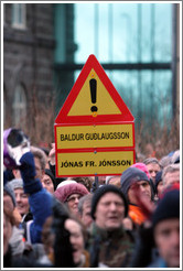 Reykjavik protest.  The sign depicts a yield symbol with the names Baldur Gu?gsson (Permanent Secretary of the Ministry of Finance) and J? Fr. J?on (Director General of the Financial Supervisory Authority, who was fired).