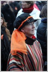 Reykjavik protest.  Woman with orange scarf symbolizing peaceful protest.