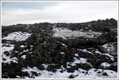 Snow-covered volcanic terrain.
