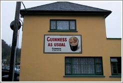 "Guinness As Usual" -- on a pub in a tiny town south of Dublin.