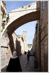 Woman and arch, Via Dolorosa, Muslim Quarter, Old City of Jerusalem.