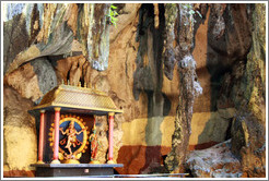 The goddess Lakshmi under stalactites, Batu Caves.