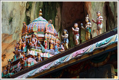 Figures on roof, temple, 2nd level, Batu Caves.