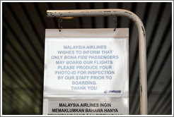 Sign declaring that only "bona fide" passengers may board Malaysia Airlines flights, Kuala Lumpur International Airport.