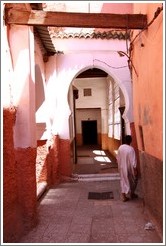 Man and doorway leading to a mosque in the Medina.