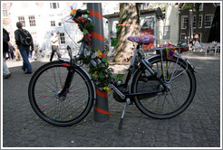 Bicycle decorated with flowers.