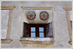 Window, with Romansh designs.