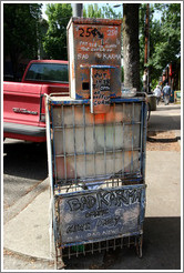 Newspaper vending machine with Bad Karma graffiti.  Hoyt St. and 23rd Ave.  Alphabet District.
